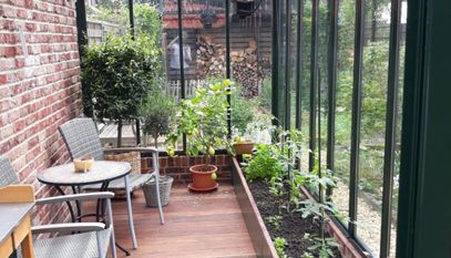 Should I have a conservatory or free-standing greenhouse?